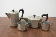 An Arts & Crafts pewter tea set from Liberty London
